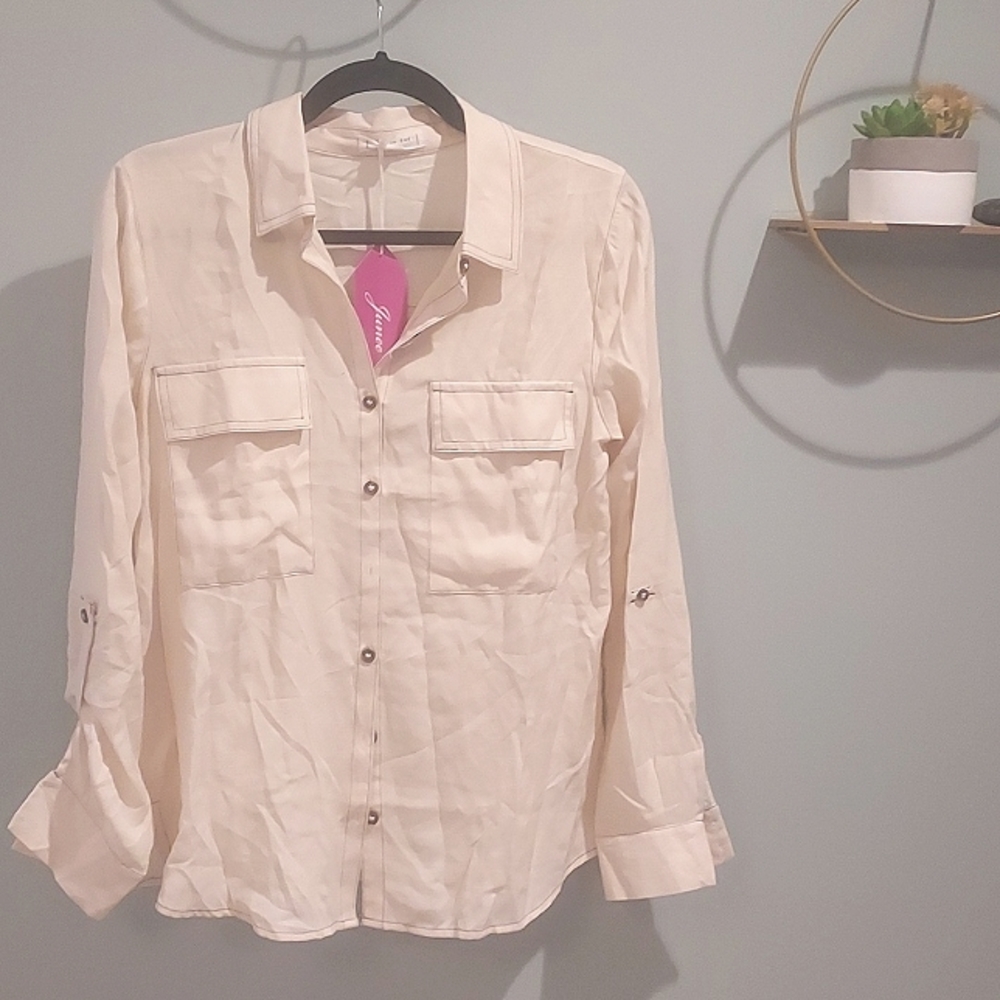 Beige button down shirt. Size Small.